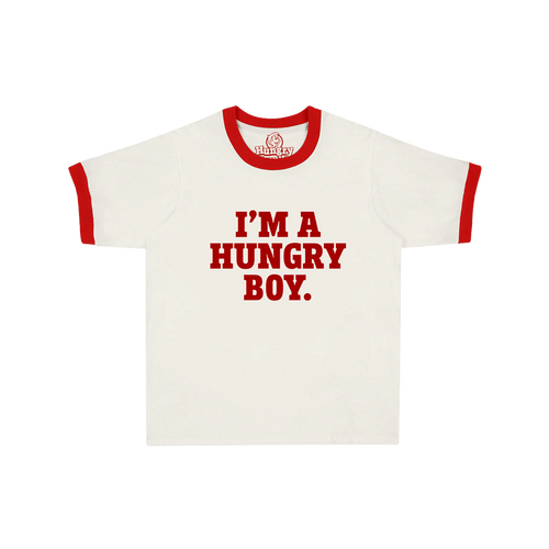 A white ringer t-shirt with red trim on the collar and sleeve cuffs, featuring the text 'I'M A HUNGRY BOY.' printed in red across the chest.